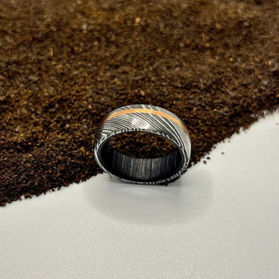 Handmade Black Damascus Steel Ring with Reddish Wood Sleeve | Unique & Durable - RustyStudioUSA