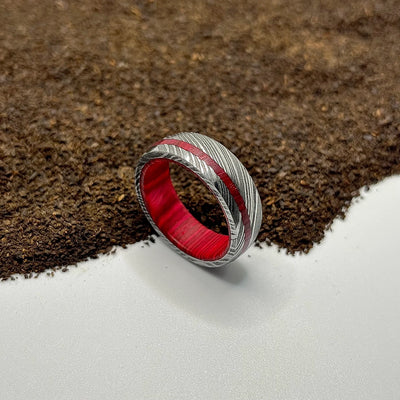 Handmade Black Damascus Steel Ring with Reddish Wood Sleeve | Unique & Durable - RustyStudioUSA